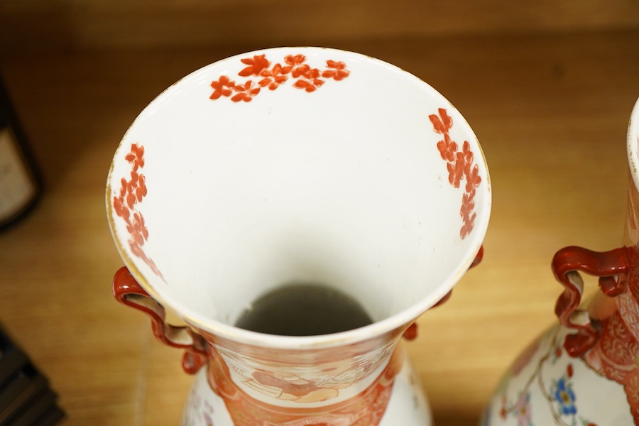 A pair of Japanese Kutani two handled vases, 41cm high